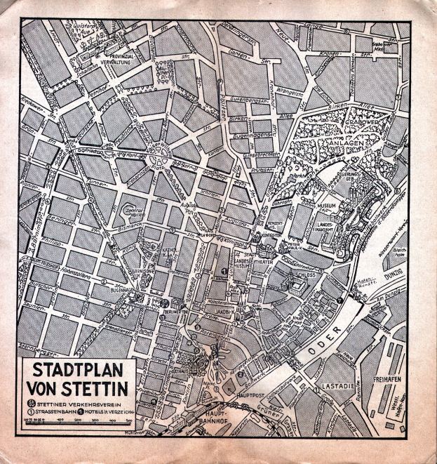 Detailiertes altes Stadtplan von Stuttgart auf vergilbtem Papier, das Straßen, Gebäude und Sehenswürdigkeiten zeigt, mit begleitendem handgeschriebenem Text.