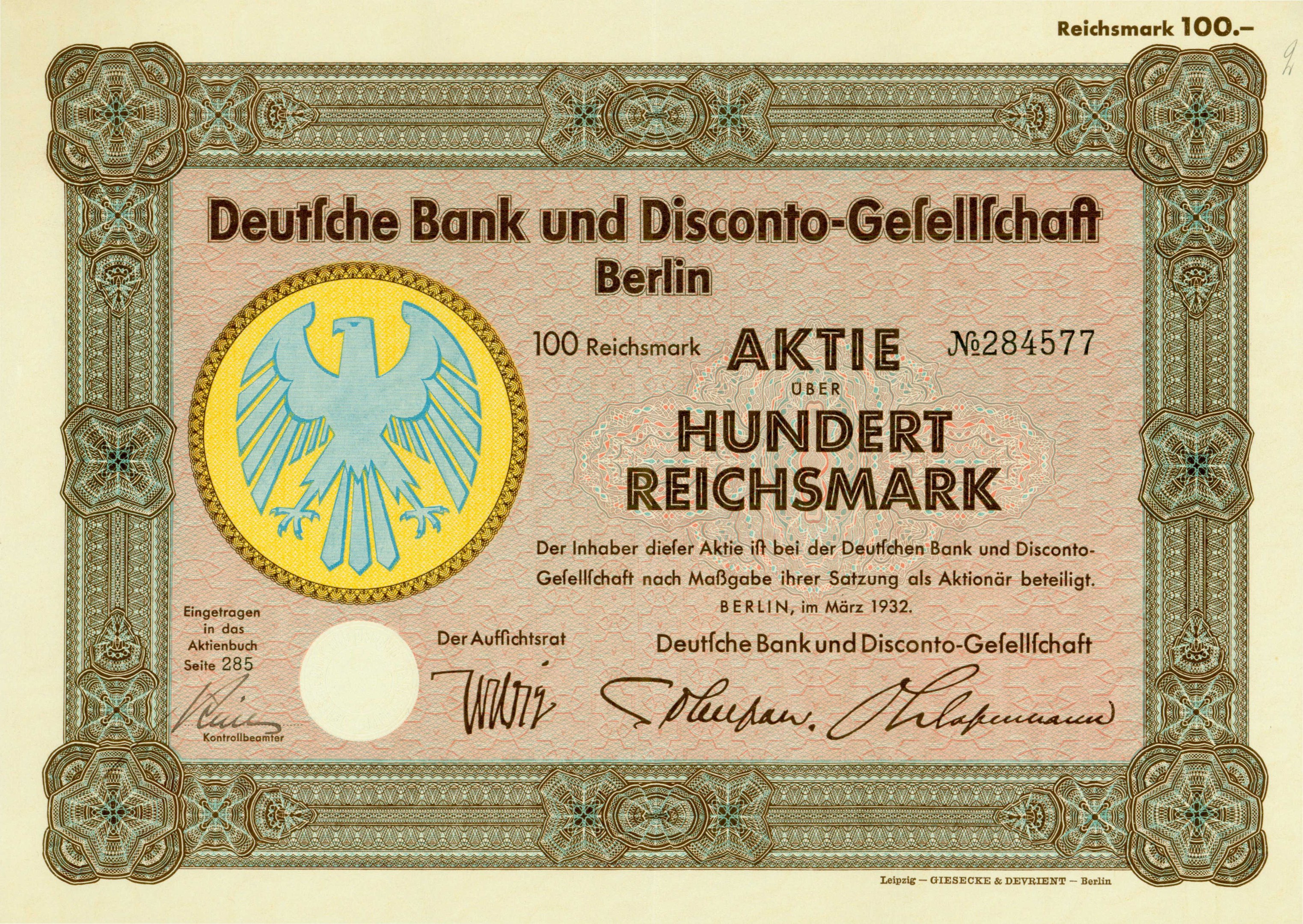 Alte deutsche Banknote mit einem Vogeldesign und der Aufschrift "Deutsche Bank und Disconto-Gefellichaft Berlin".