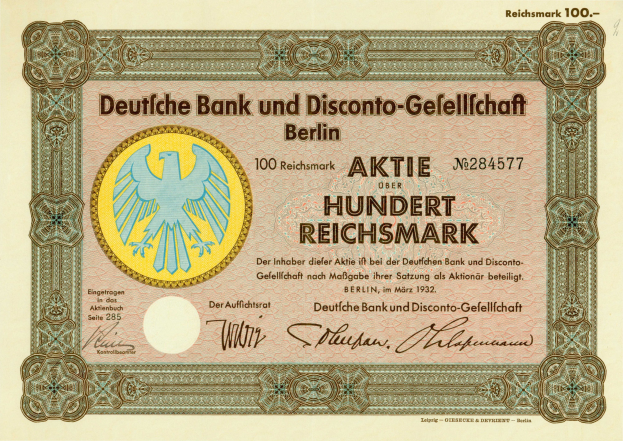 Alte deutsche Banknote mit einem Vogeldesign und der Aufschrift "Deutsche Bank und Disconto-Gefellichaft Berlin".
